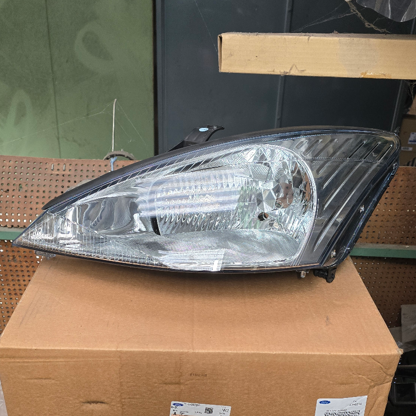 1152094 Optique avant gauche Ford Focus